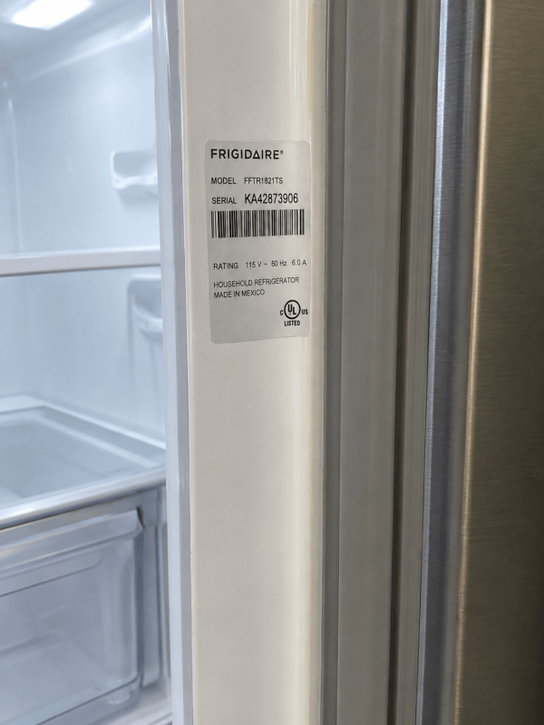 Front-load washing machine with door open
